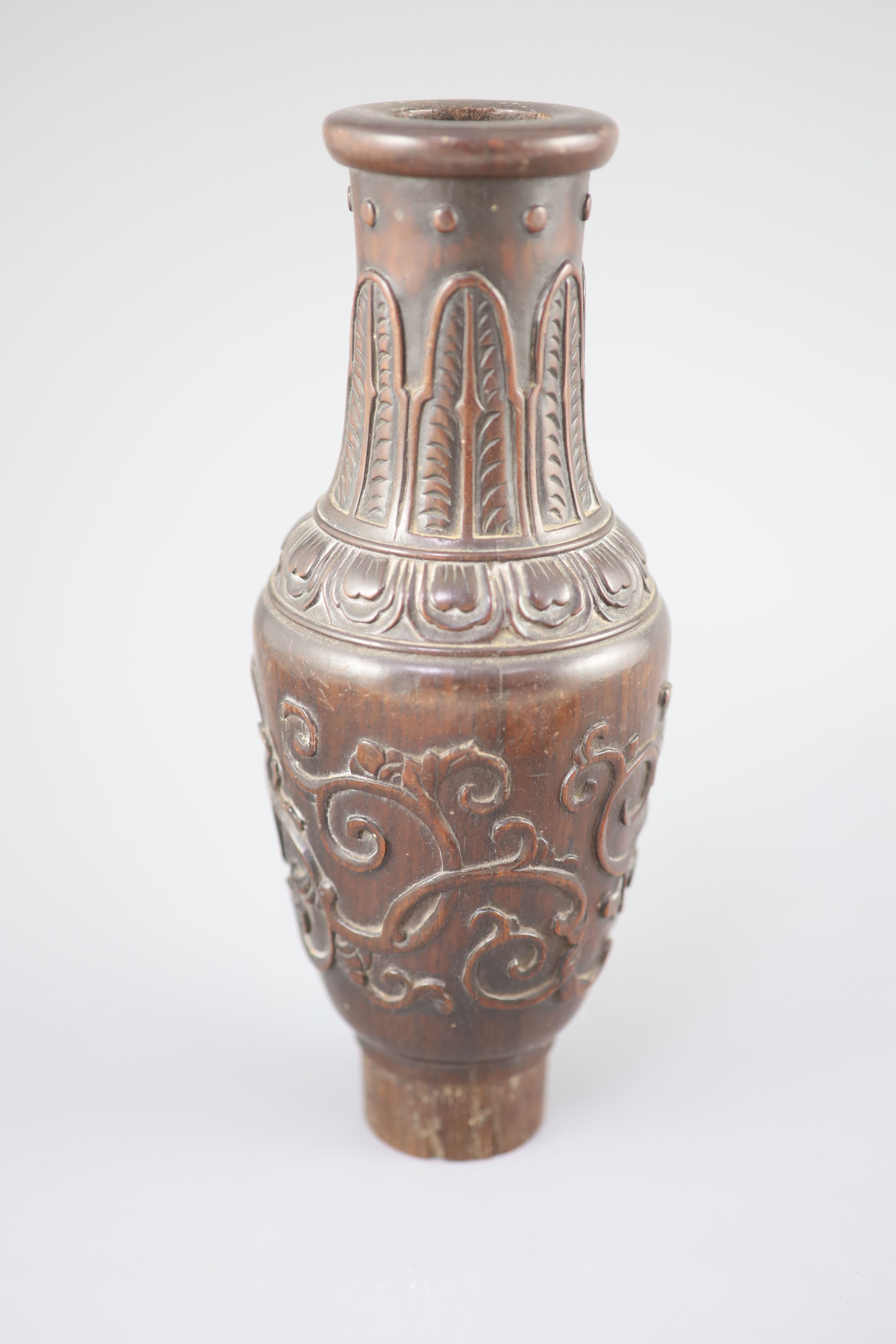 A Chinese hongmu model of a vase and a Chinese boxwood dragon handle, 18th century,